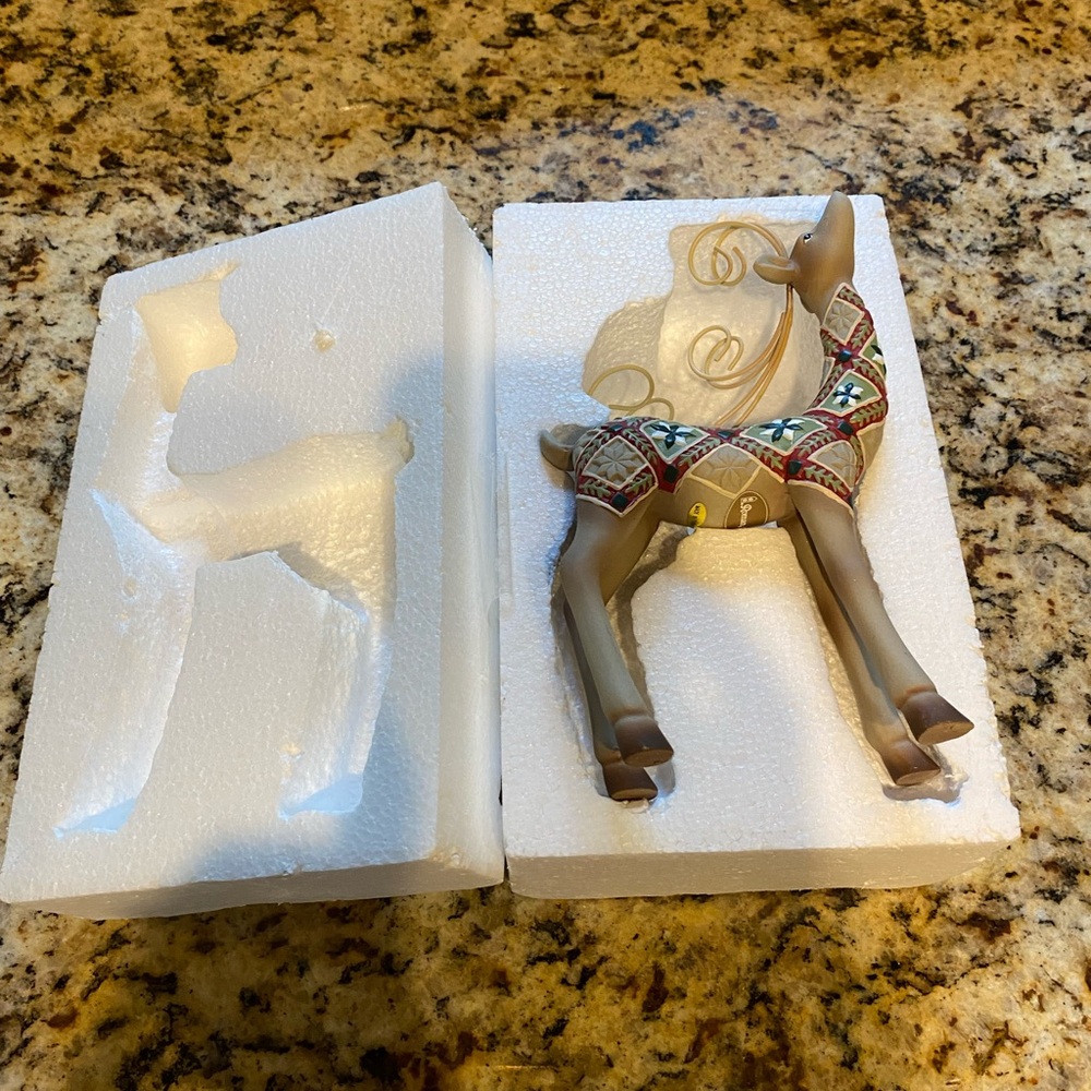 Decorative Reindeer Figurine with Patterned Saddle